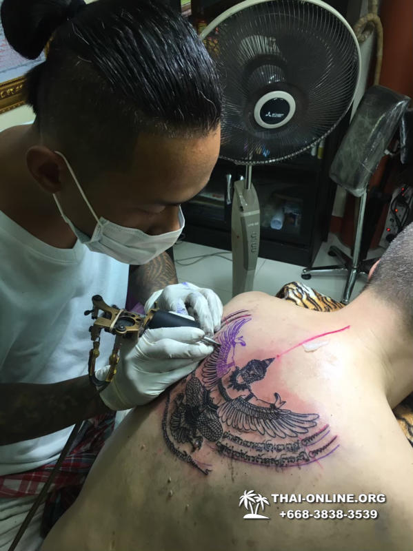 Sak Yant tattoos by Ajarn Dam in Forest Monastery of Wat Bo Thong trip from Pattaya to Rayong with Seven Countries tourist agency Thailand photo 7
