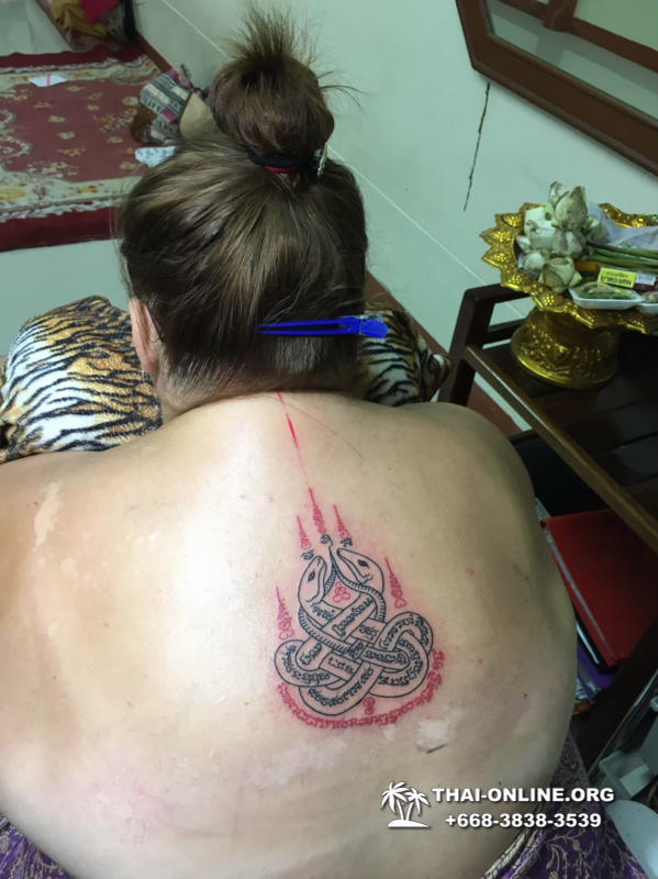 Sak Yant tattoos by Ajarn Dam in Forest Monastery of Wat Bo Thong trip from Pattaya to Rayong with Seven Countries tourist agency Thailand photo 8