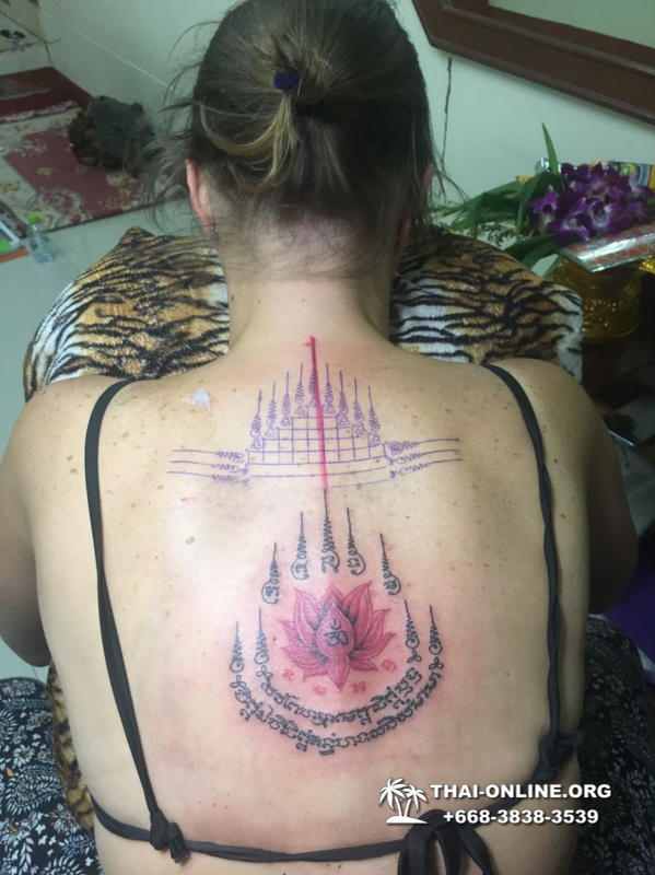 Sak Yant tattoos by Ajarn Dam in Forest Monastery of Wat Bo Thong trip from Pattaya to Rayong with Seven Countries tourist agency Thailand photo 4