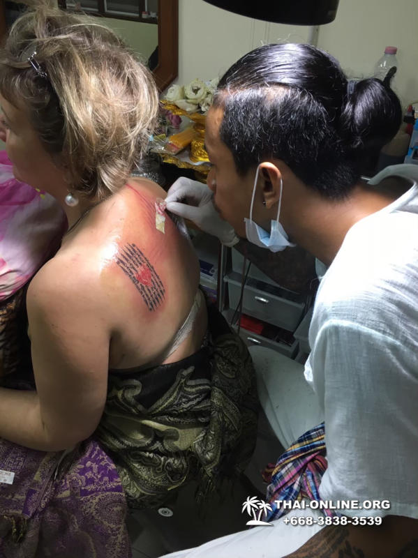 Sak Yant tattoos by Ajarn Dam in Forest Monastery of Wat Bo Thong trip from Pattaya to Rayong with Seven Countries tourist agency Thailand photo 3