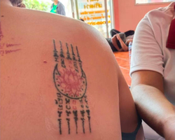 Tattoo Sak Yant Ajan Chalee from Pattaya in Thailand photo 45